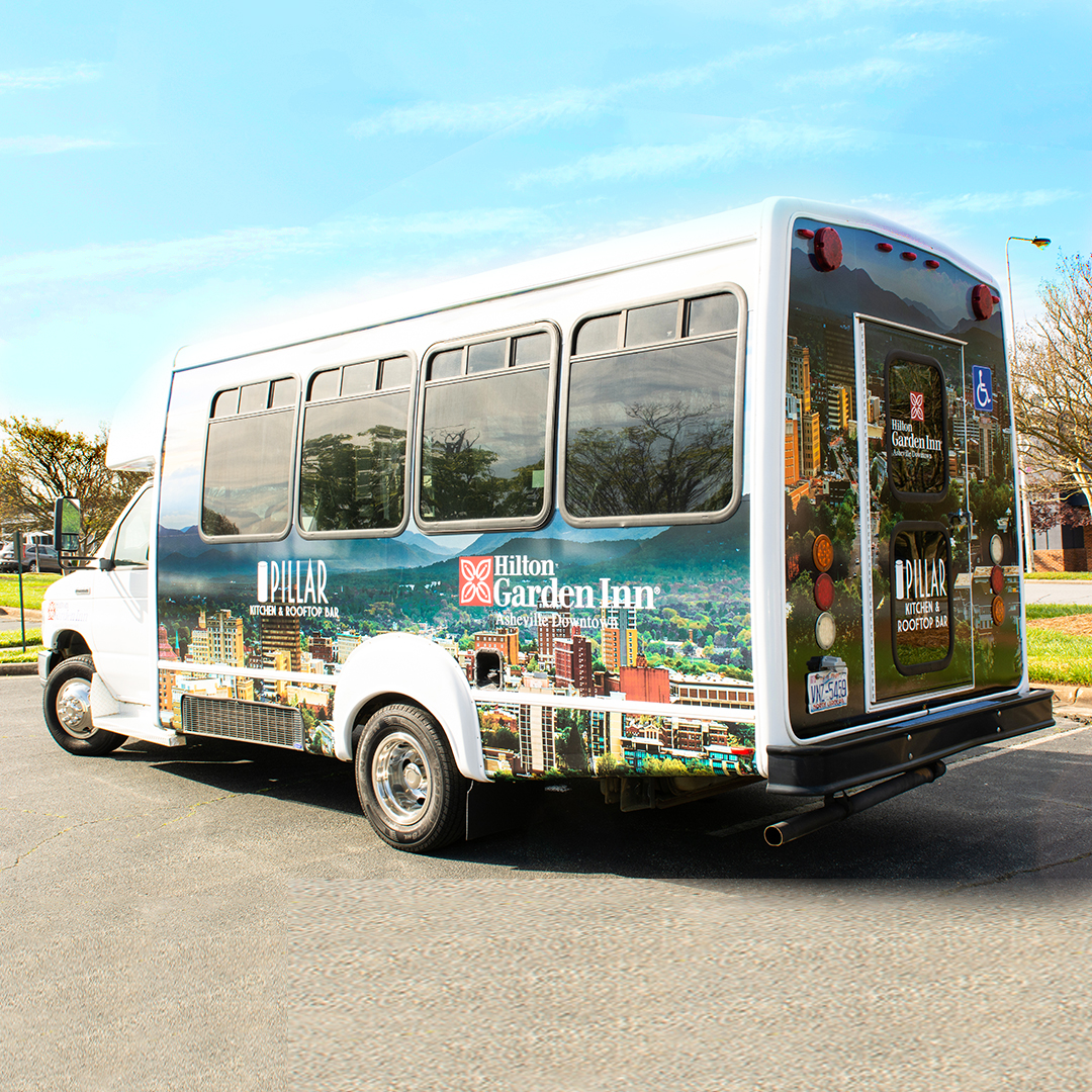 Quality Oil/Hilton Gardens      
shuttle bus
at the Asheville, NC location; This is a 3M vehicle wrap with cut vinyl decals.